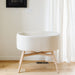 M26834GYLB,Babyletto,babyletto x GATHRE Capsule Bassinet in Ivory